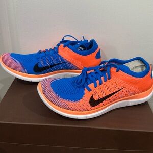 New- Nike Flyknit 4.0 Orange and Blue  Sneakers Women's size 9

Unworn

No Box